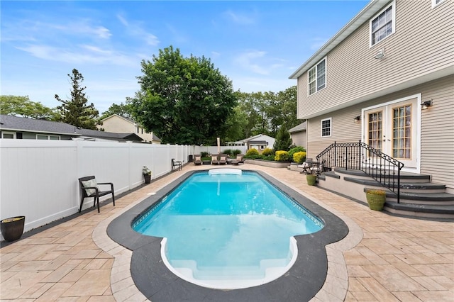 1710 Phenix Ave, Cranston, RI 02921 - view of pool with french doors, a patio, and a fenced backyard