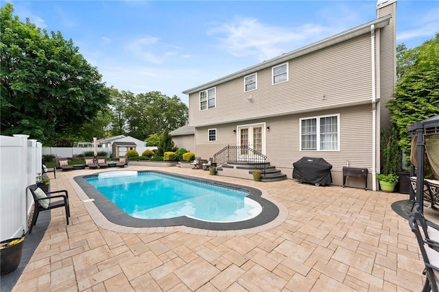 1710 Phenix Ave, Cranston, RI 02921 - view of swimming pool featuring french doors, a patio, grilling area, and a fenced backyard