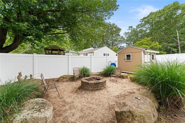 1710 Phenix Ave, Cranston, RI 02921 - fenced backyard featuring a fire pit and a gazebo