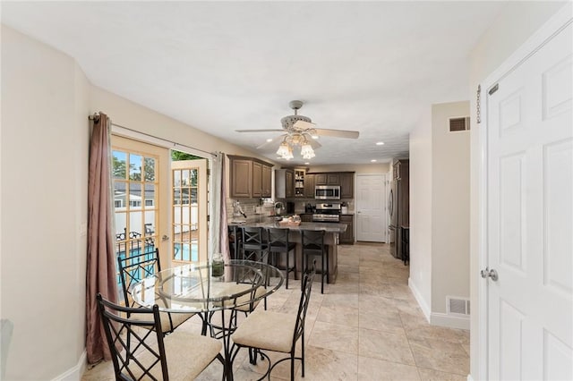 1710 Phenix Ave, Cranston, RI 02921 - dining area with baseboards, a ceiling fan, and recessed lighting
