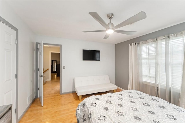 1710 Phenix Ave, Cranston, RI 02921 - bedroom with light wood-style floors, baseboards, and a ceiling fan