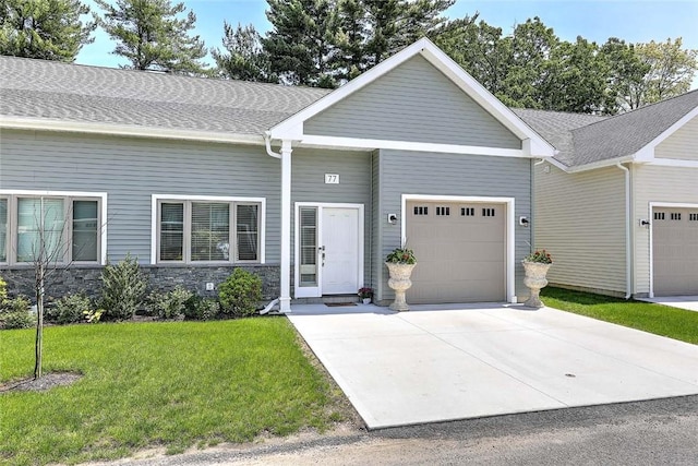 77 W Valley Cir Unit 77, West Warwick, RI 02893 - view of front of home with a garage, a front lawn, driveway, and a shingled roof