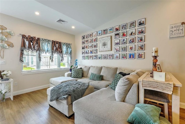 77 W Valley Cir Unit 77, West Warwick, RI 02893 - living area with wood finished floors, baseboards, and recessed lighting