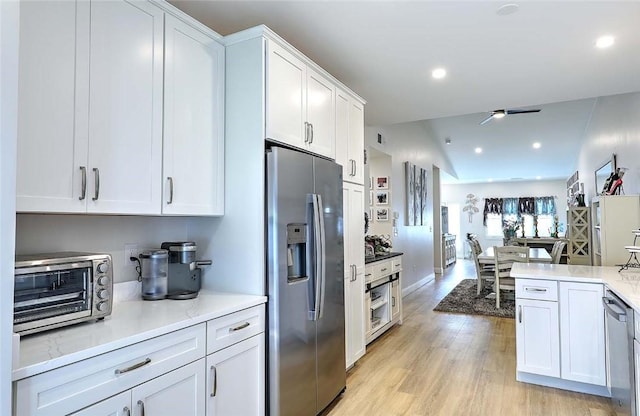 77 W Valley Cir Unit 77, West Warwick, RI 02893 - kitchen featuring stainless steel appliances, white cabinets, light wood-type flooring, recessed lighting, and light countertops