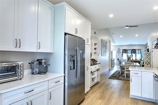 77 W Valley Cir Unit 77, West Warwick, RI 02893 - kitchen featuring stainless steel appliances, white cabinets, light wood finished floors, light countertops, and recessed lighting