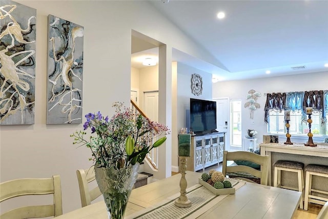 77 W Valley Cir Unit 77, West Warwick, RI 02893 - dining space featuring lofted ceiling, recessed lighting, and stairs