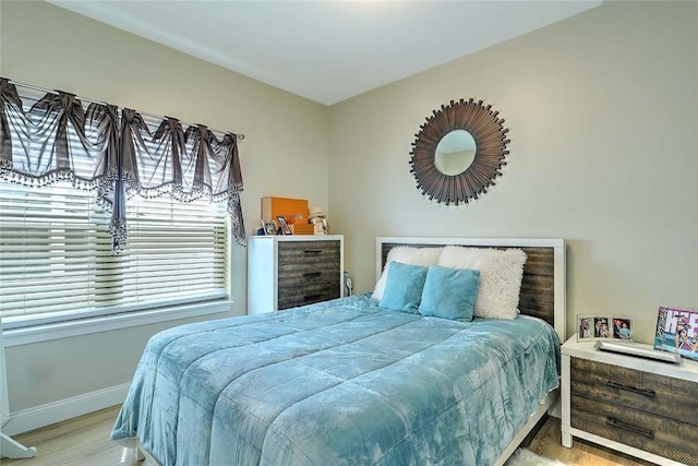 77 W Valley Cir Unit 77, West Warwick, RI 02893 - bedroom featuring wood finished floors and baseboards