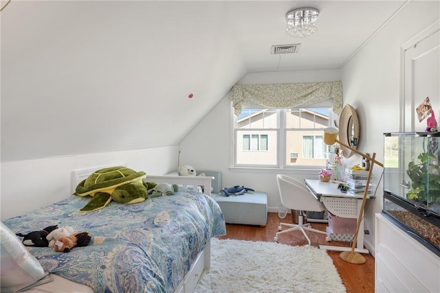 7 Maloney Ln, Middletown, RI 02842 - bedroom with wood finished floors and vaulted ceiling