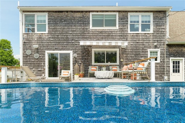 7 Maloney Ln, Middletown, RI 02842 - back of property with an outdoor pool