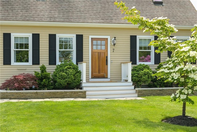 7 Maloney Ln, Middletown, RI 02842 - entrance to property with a shingled roof and a lawn