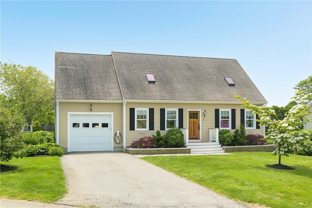 7 Maloney Ln, Middletown, RI 02842 - cape cod house with asphalt driveway, a garage, and a front yard