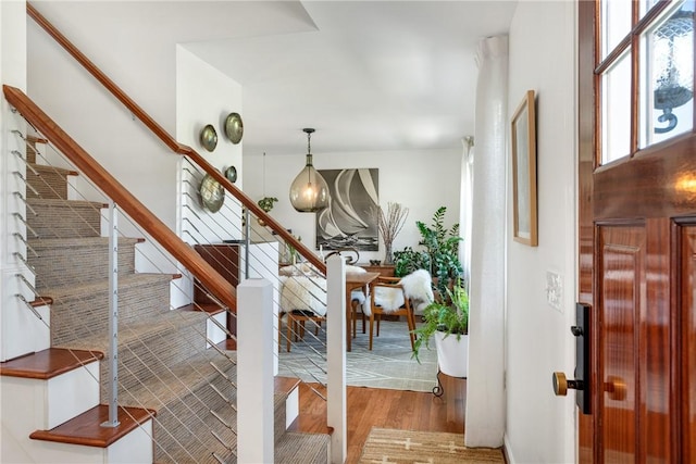 7 Maloney Ln, Middletown, RI 02842 - foyer entrance featuring stairway and wood finished floors