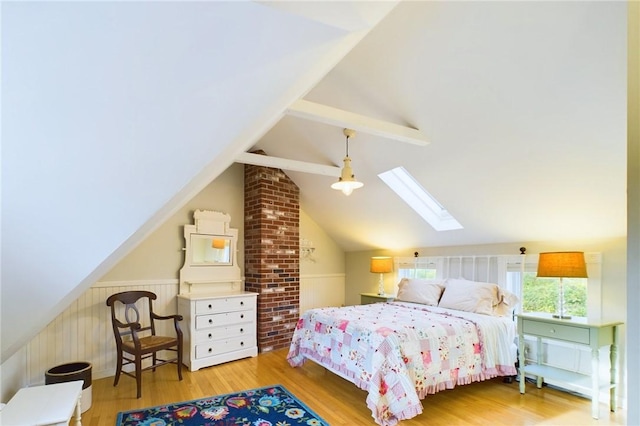 1087 Lakeside Dr, Block Island, RI 02807 - bedroom with a skylight and wood finished floors