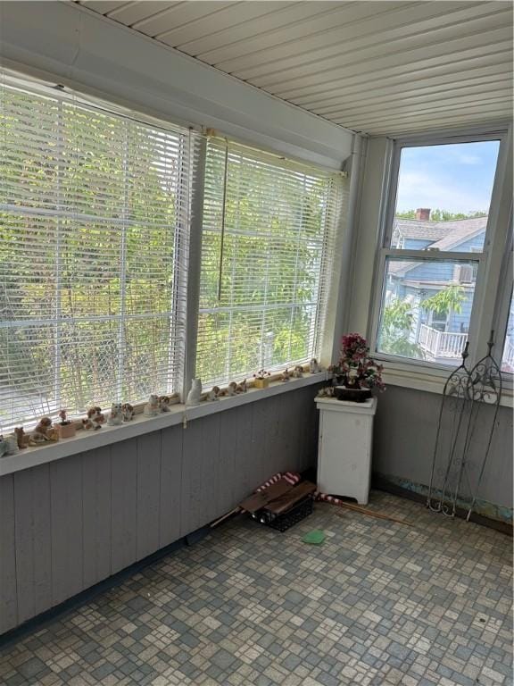 259 Park Ave, Woonsocket, RI 02895 - unfurnished sunroom with brick patterned flooring