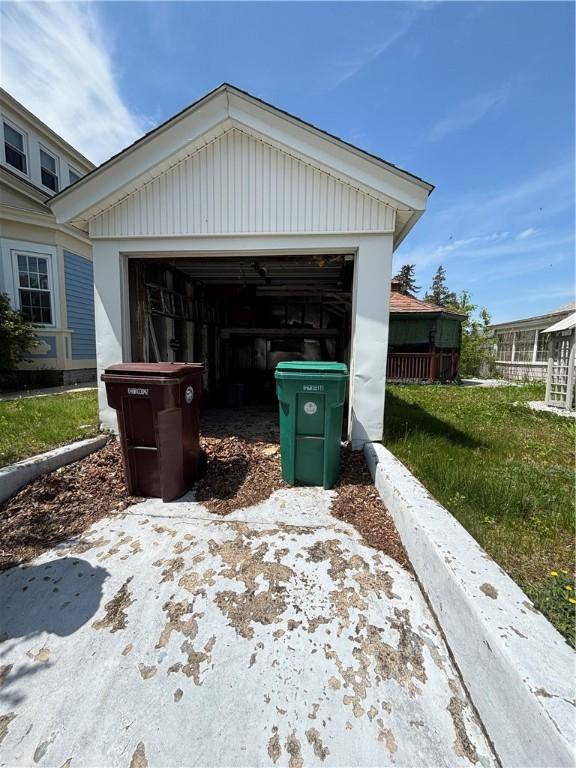 259 Park Ave, Woonsocket, RI 02895 - garage featuring driveway