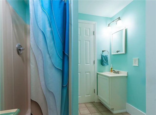 369 Vine St, Pawtucket, RI 02861 - full bathroom featuring tile patterned floors, vanity, a shower with shower curtain, and baseboards