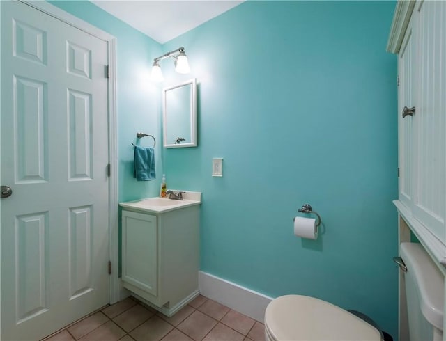 369 Vine St, Pawtucket, RI 02861 - half bath with toilet, tile patterned flooring, vanity, and baseboards