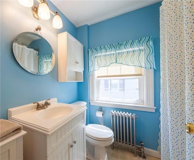 369 Vine St, Pawtucket, RI 02861 - bathroom featuring radiator heating unit, vanity, toilet, a shower with curtain, and tile patterned floors