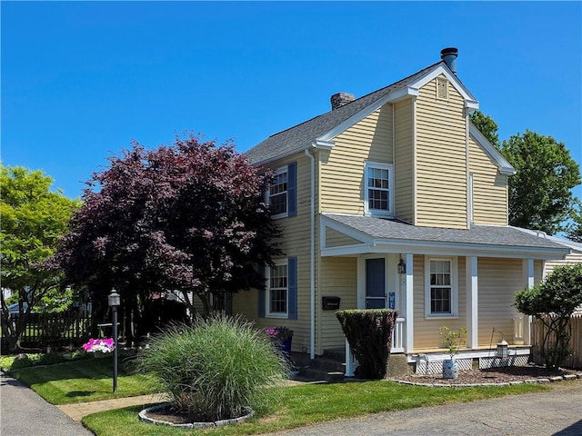 369 Vine St, Pawtucket, RI 02861 - view of front of home with covered porch, a chimney, and roof with shingles