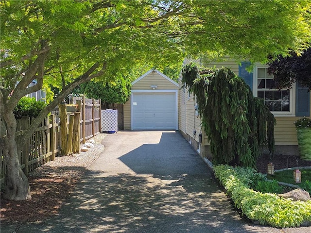 369 Vine St, Pawtucket, RI 02861 - detached garage featuring asphalt driveway