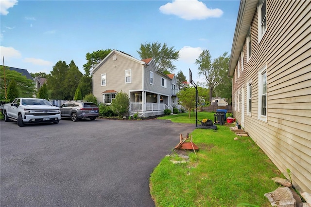 69 Arnold St, Lincoln, RI 02865 - view of property exterior featuring a yard