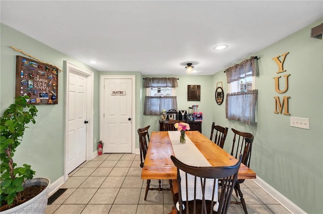 69 Arnold St, Lincoln, RI 02865 - dining space with light tile patterned floors, baseboards, and recessed lighting