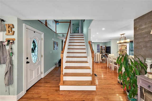 69 Arnold St, Lincoln, RI 02865 - entrance foyer with wood finished floors, stairs, baseboards, and recessed lighting