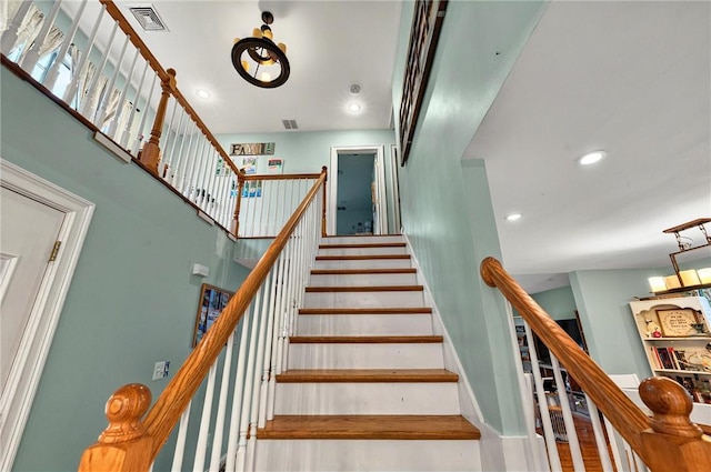 69 Arnold St, Lincoln, RI 02865 - stairway featuring recessed lighting, baseboards, and wood finished floors