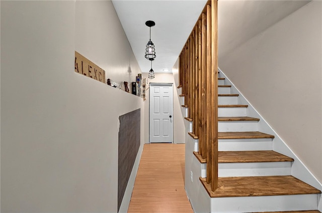 69 Arnold St, Lincoln, RI 02865 - stairway featuring wood finished floors