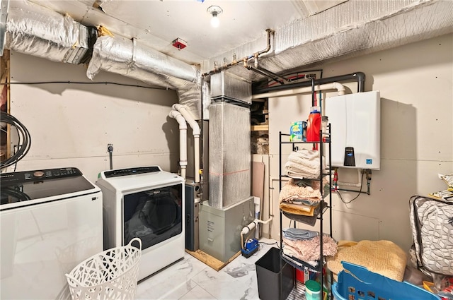 69 Arnold St, Lincoln, RI 02865 - laundry room with water heater, separate washer and dryer, marble finish floors, and heating unit