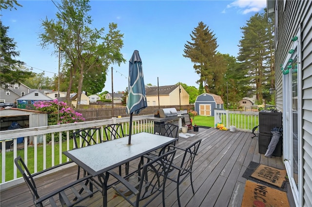 69 Arnold St, Lincoln, RI 02865 - wooden deck with outdoor dining space, a residential view, and grilling area