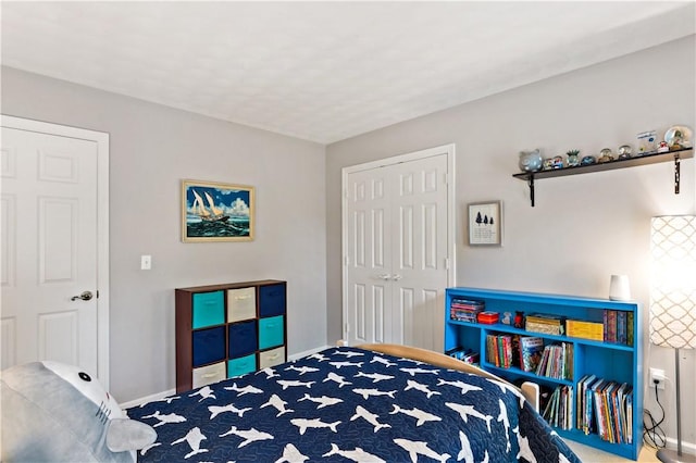 110 Fieldstone Ln, North Kingstown, RI 02874 - bedroom featuring baseboards, a closet, and carpet flooring