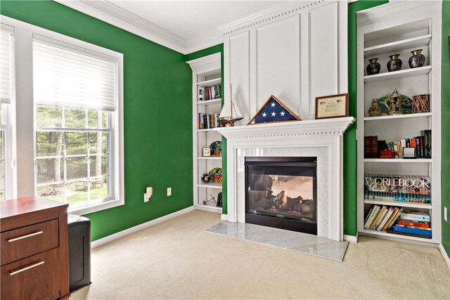 110 Fieldstone Ln, North Kingstown, RI 02874 - living room with carpet, ornamental molding, plenty of natural light, a fireplace, and baseboards