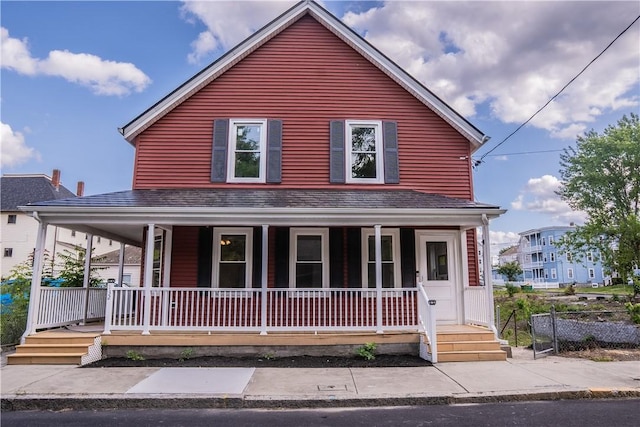 132 Chestnut St, Woonsocket, RI 02895 - farmhouse inspired home featuring covered porch and a shingled roof