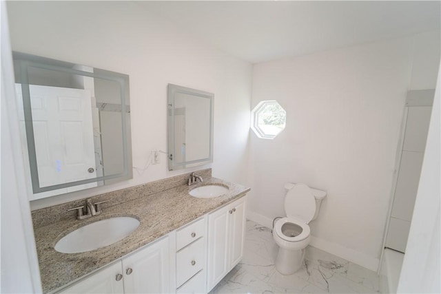132 Chestnut St, Woonsocket, RI 02895 - bathroom featuring baseboards, double vanity, marble look tile flooring, and toilet