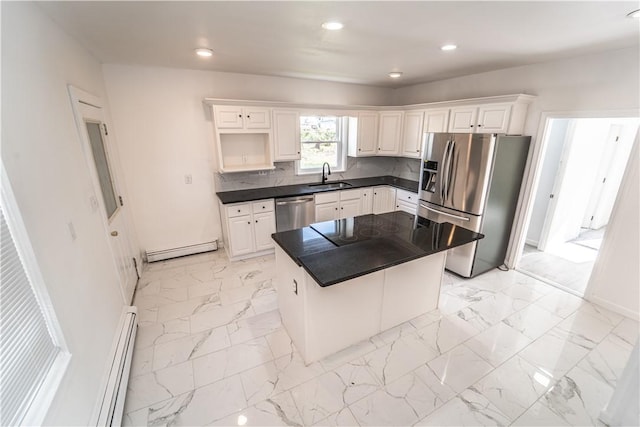 132 Chestnut St, Woonsocket, RI 02895 - kitchen featuring a sink, stainless steel appliances, a baseboard radiator, dark countertops, and recessed lighting