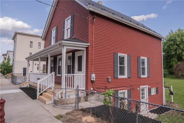 132 Chestnut St, Woonsocket, RI 02895 - view of property exterior featuring a porch
