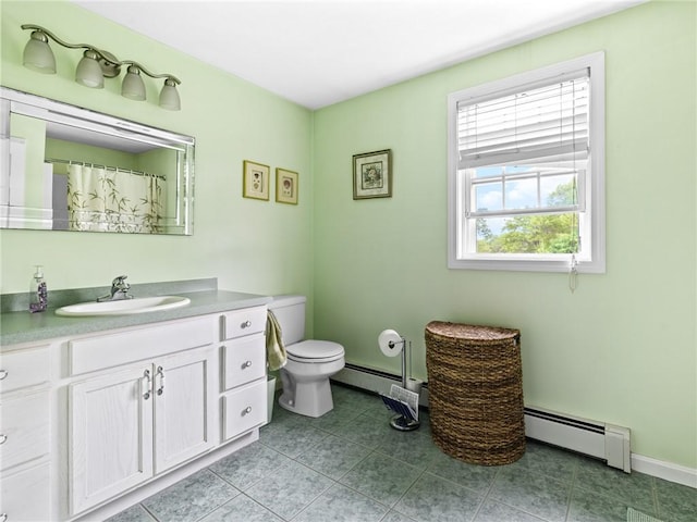 60 Broad St, Plainville, MA 02762 - bathroom with vanity, toilet, a baseboard radiator, and tile patterned floors