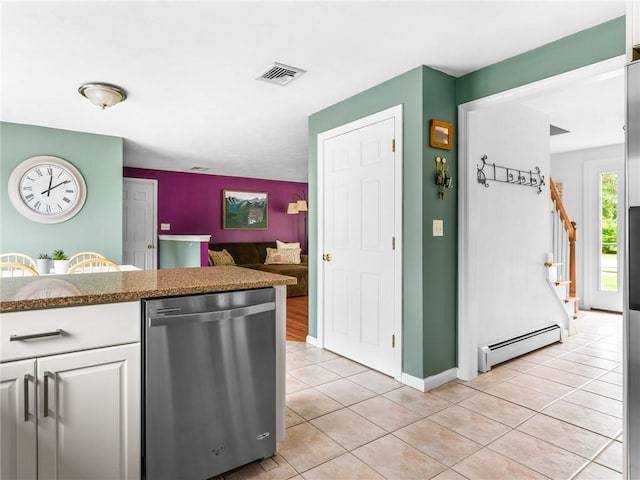 60 Broad St, Plainville, MA 02762 - kitchen with dishwasher, a baseboard heating unit, light tile patterned flooring, white cabinets, and baseboards