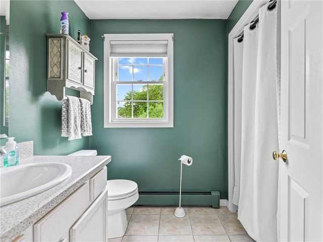 60 Broad St, Plainville, MA 02762 - bathroom with a baseboard heating unit, vanity, toilet, and tile patterned floors