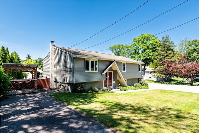 7 Lydia Ave, North Providence, RI 02904 - bi-level home featuring a chimney, a pergola, and a front lawn