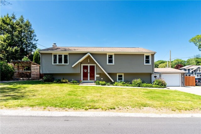 7 Lydia Ave, North Providence, RI 02904 - raised ranch featuring a garage