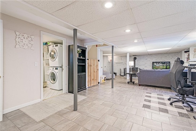 7 Lydia Ave, North Providence, RI 02904 - finished below grade area with estacked washer and dryer, an office area, a drop ceiling, baseboards, and recessed lighting