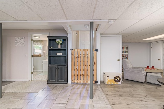 7 Lydia Ave, North Providence, RI 02904 - interior space with a drop ceiling and baseboards