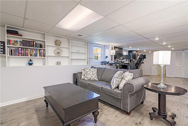 7 Lydia Ave, North Providence, RI 02904 - living room with baseboards, wood finished floors, a paneled ceiling, and recessed lighting
