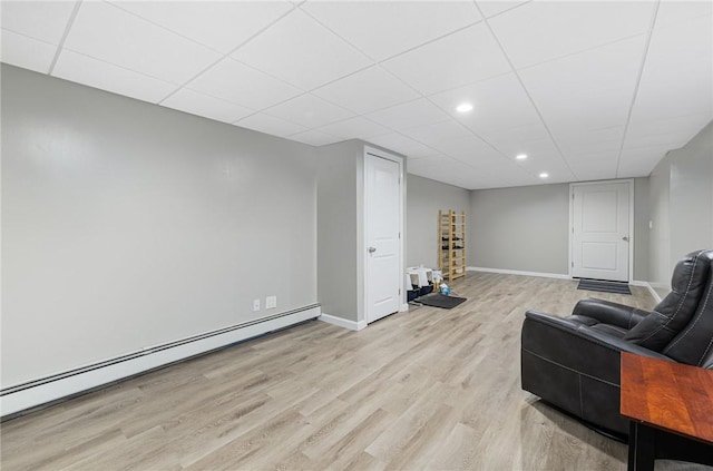 48 Nottingham Dr, Scituate, RI 02831 - sitting room featuring baseboard heating, light wood-style flooring, recessed lighting, baseboards, and a paneled ceiling