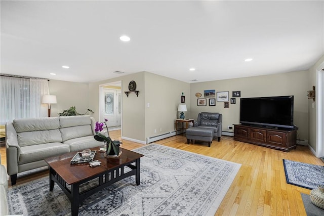 48 Nottingham Dr, Scituate, RI 02831 - living room with light wood-type flooring, a baseboard radiator, recessed lighting, baseboards, and a baseboard heating unit