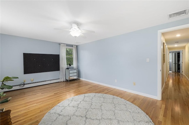 48 Nottingham Dr, Scituate, RI 02831 - living room featuring a baseboard heating unit, wood finished floors, a ceiling fan, and baseboards