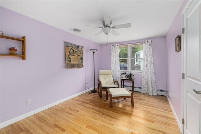48 Nottingham Dr, Scituate, RI 02831 - sitting room with ceiling fan, light wood-style floors, and baseboards