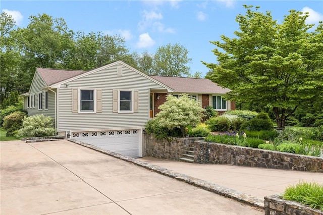 48 Nottingham Dr, Scituate, RI 02831 - single story home featuring an attached garage and concrete driveway
